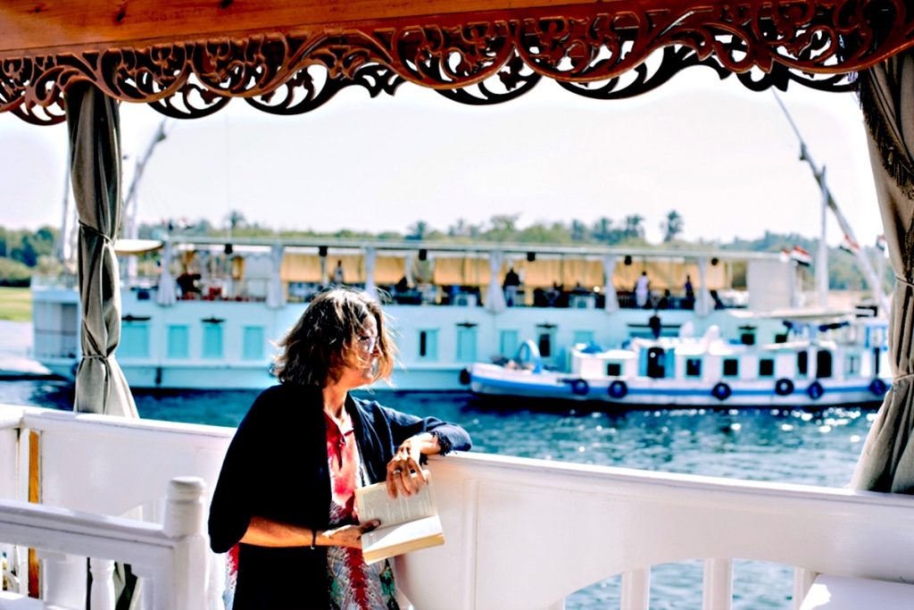 Sunset dining on deck of Dahabiya Nile Cruise