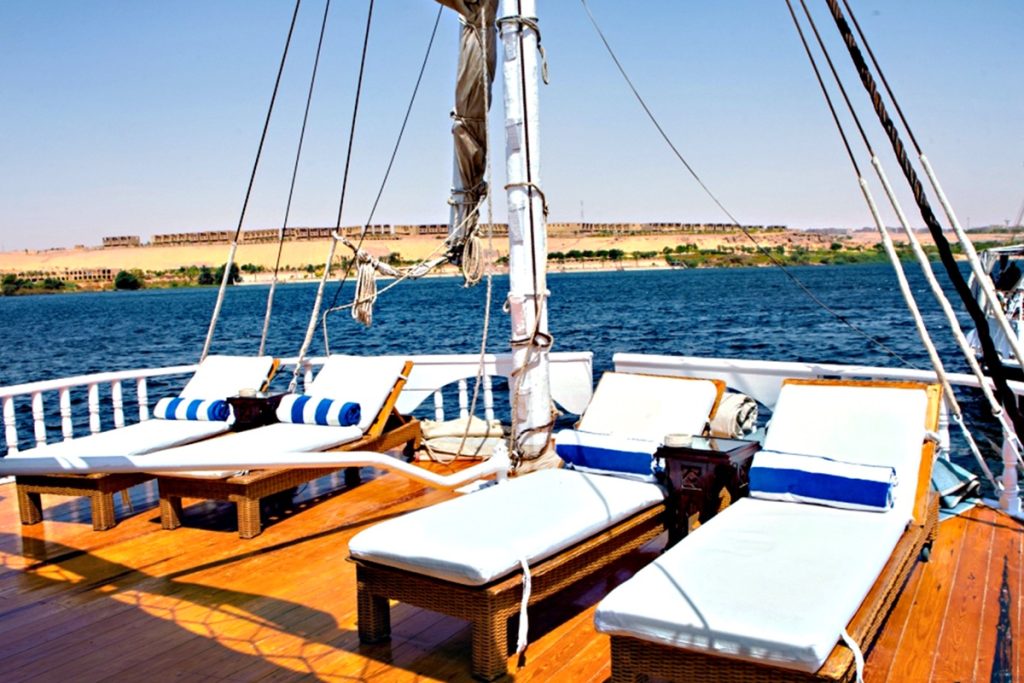 Sunset dining on deck of Dahabiya Nile Cruise